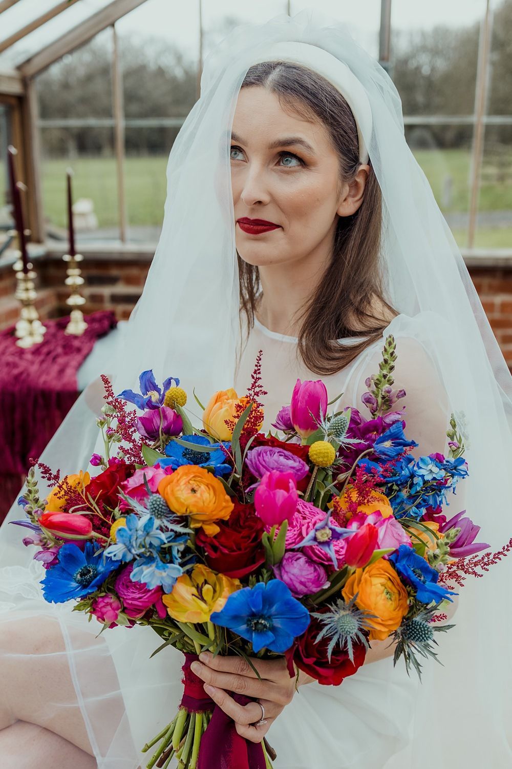 Florist arranging a stunning bridal bouquet